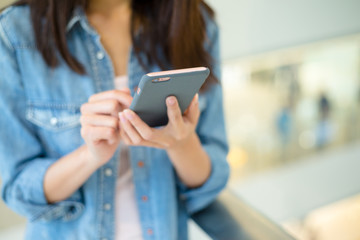 Woman hold with mobile phone