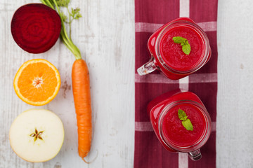 Vegetable and fruit cocktail, served in a jar, with fresh beets,