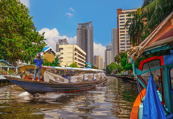 Fototapeta na wymiar River boat transporting passengers and tourist down Chao Praya river , Bangkok , Thailand 