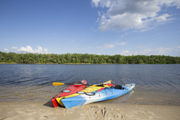 Camping on the beach.Kayak on the beach on a sunny day.