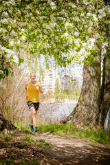 Senior Man Running in the Forest