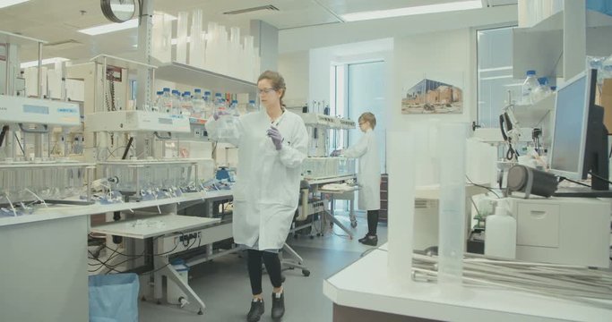 Scientist working in a pharmaceutical research lab.