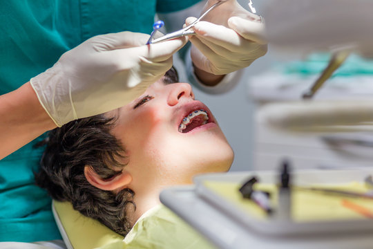 Boy In The Dental Chair