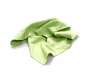 Crumpled green microfiber cloth isolated on white background