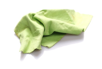 Crumpled green microfiber cloth isolated on white background