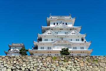 Himeji Castle in Japan against a clear blue sky