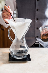 barista making coffee