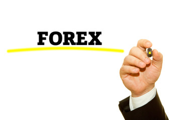 Businessman hand writing FOREX.