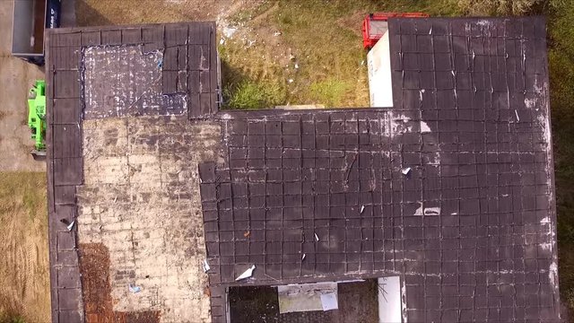 flight over ruin of a school - birdview