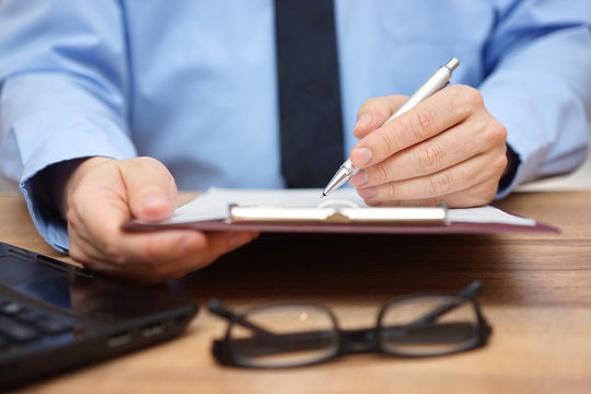 Manager reading report, concept of accounting,,report and leader