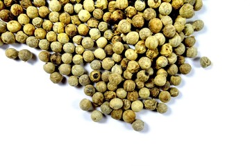 white peppers on the white background