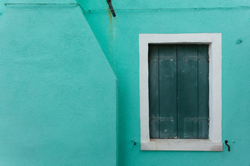 View of a closed balcony from Burano island, Venice