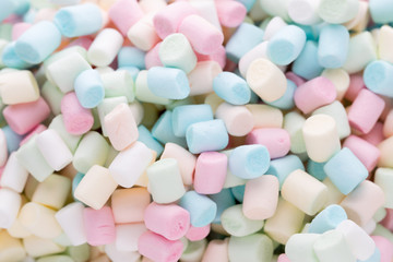 Background or texture of colorful mini marshmallows.