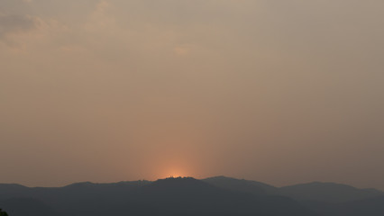 sunset on mountain hill