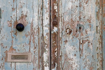 Aged door with letterbox