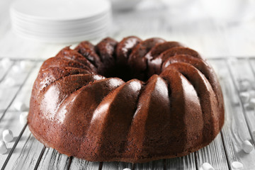 Chocolate cake on wooden background