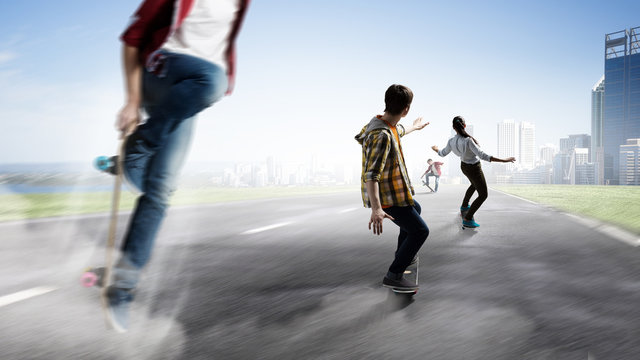 Young people riding skateboard