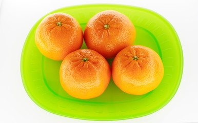Healthy food series with tangerines on light background