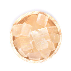 A wooden bowl full of freshly picked Aloe vera plant, peeled and