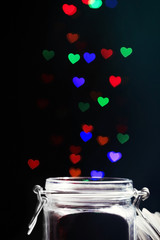 Love magic bottle on black background