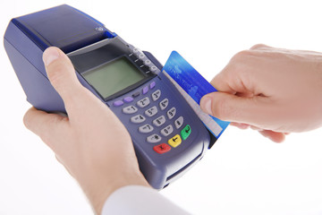 Businessman using payment terminal, isolated on white