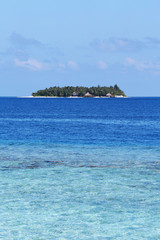 Seascape with small island.