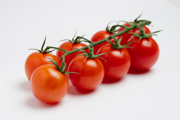 cherry tomatoes on white background