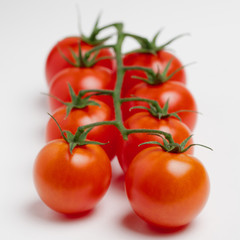 cherry tomatoes on white background