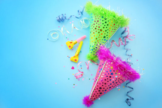 Party hats on blue background