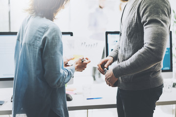 Obraz premium Business meeting picture.Photo woman showing papers chart.Managers crew working with new startup project.Idea presentation, analyze marketing plans, statistics document. Blurred background,film effect