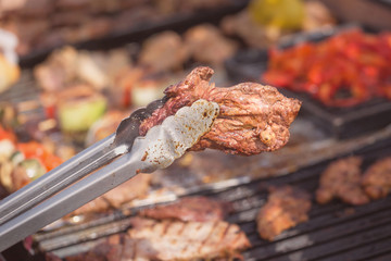 Roasted meat on the grill, parrilla, asado