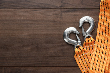 orange towing rope on the wooden table