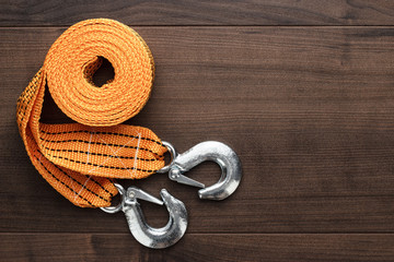 orange towing rope on the wooden table