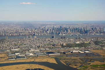 Aerial view of the New York City skyline with New Jersey in the foreground