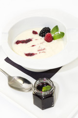 semolina with jam on a white background in the restaurant