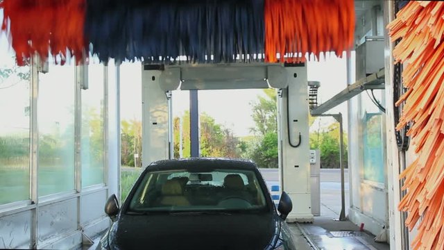 Automatic Tunnel Car Wash -End of the washing process and removal of the rollers