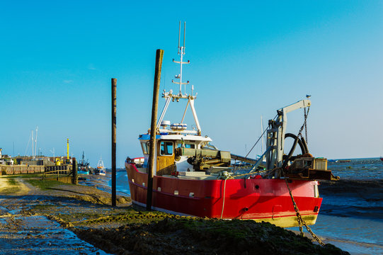 Red Boat at Low Tide