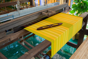 Detail of weaving loom for homemade silk or textile production