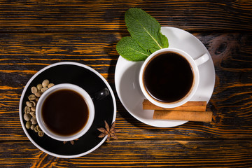 Top down view of coffee and tea in cups