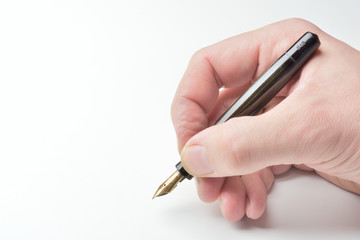 pen in the man's hand to signature