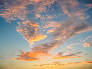 Spectacular colored clouds at sunset in the sky. Abstract and background concept. Copy space.
