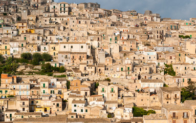 Houses packed in the old town of Modica, in Sicily