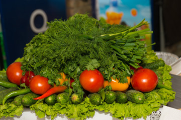 Display of fresh salad ingredients at a market
