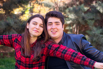 Fototapeta premium young beautiful couple relaxing outdoors