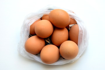 Eggs in a plastic bag, shopping eggs at the market