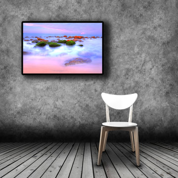 Plasma TV on the wall of the room with empty chair