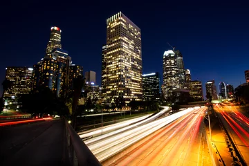 Fototapeten City of Los Angeles Downtown bei Sonnenuntergang mit Lichtspuren © romanslavik.com