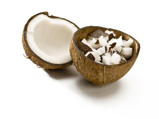 chopped coconut in empty coconut shell