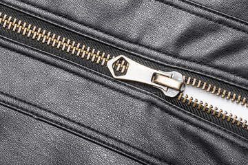 Black leather jacket metal zipper closeup. © Paweł Michałowski