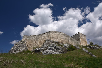 Fototapeta na wymiar Wall and tower of Spis Castle, Slovakia at summer day